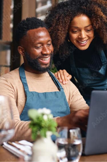 Restaurant owner discussing accounts with an accountant